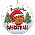 An Orange Basketball in a Santa Hat Looped With Coloured Lights Between Two Pines. Ceramic Keepsake.