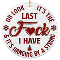 Red Glitter Script Circling a Wood Look Face With a Blunt End of Year Line. Ceramic Novelty Keepsake.