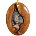Squirrel With an Acorn Peeking From a Polished Wood Hollow. Oval Ceramic Keepsake for Backyard Wildlife Fans.