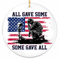 Kneeling Soldier Before a Battle Cross Over a Distressed Flag. Ceramic Memorial Keepsake for Service Families.
