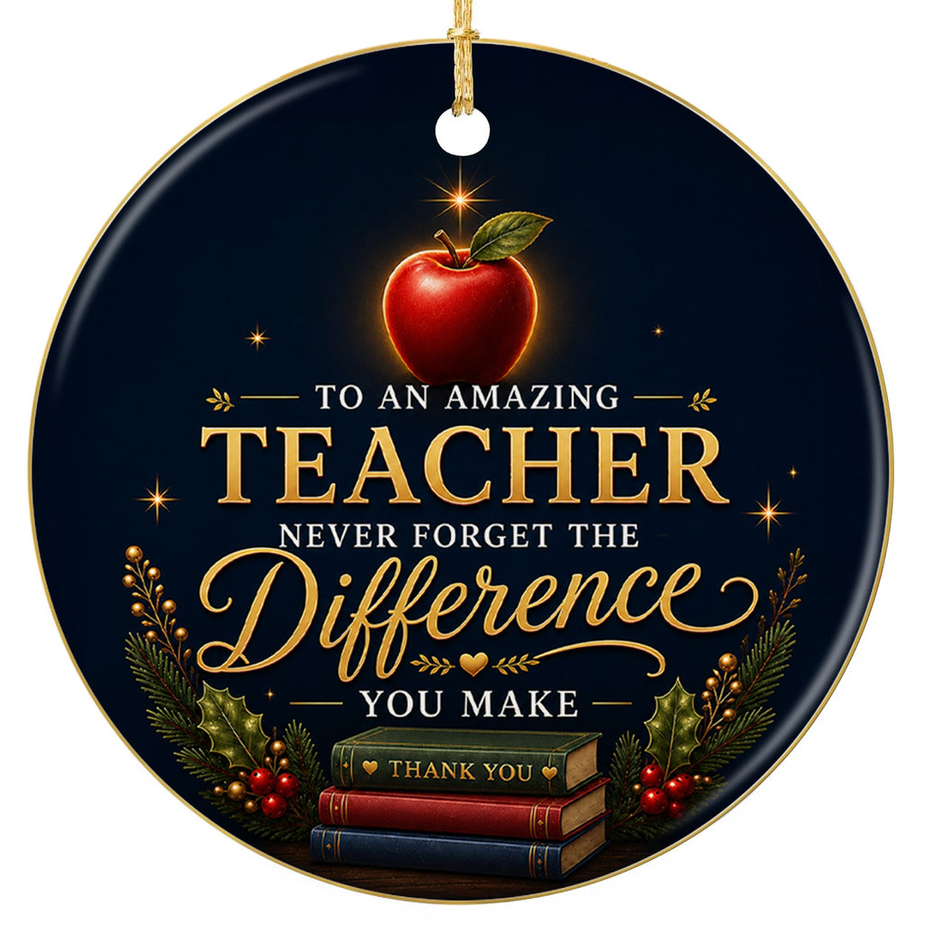 A glossy red apple resting on a stack of three gold-edged books, framed by pine. Ceramic keepsake for classroom teachers