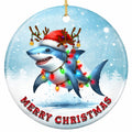 A Grinning Great White in a Santa Hat and Baubled Antlers Wrapped in Bulb Lights. Ceramic Keepsake.