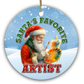 Santa at an Easel Holding a Loaded Paint Palette and Brush. Ceramic Keepsake for Painters and Art Students.