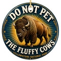 Do Not Pet the Fluffy Cows design on a glazed ceramic disc. Keepsake for national park visitors, hikers and bison fans.