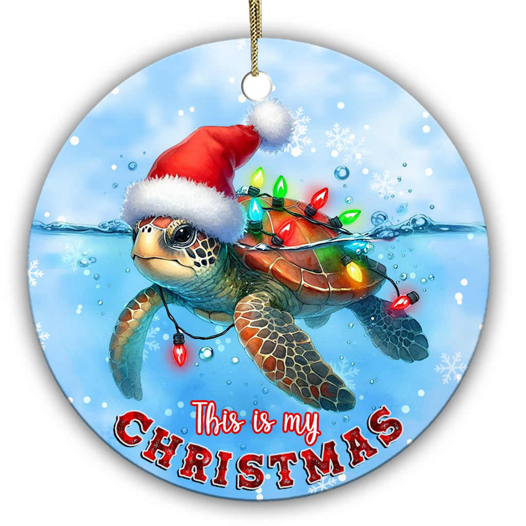 Sea Turtle Gliding Below the Waterline in a Santa Hat and Bulb Lights. Ceramic Keepsake for Ocean Lovers.