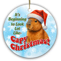 Capybara in a Santa Hat on Icy Blue With Big Snowflakes. Ceramic Keepsake for Capybara-Obsessed Teens.