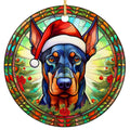 Leaded Glass Doberman in a Santa Hat Before a Radiant Sunburst. Ceramic Keepsake for Doberman Owners.