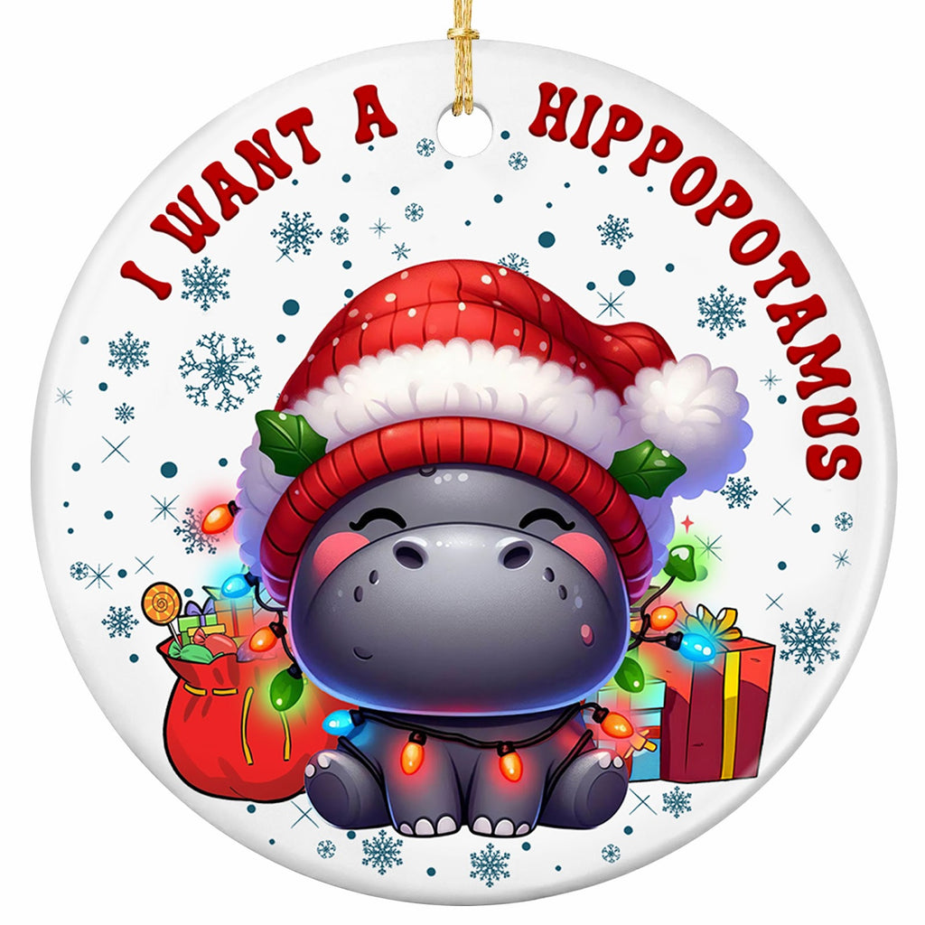 Chibi Baby Hippo in an Oversized Santa Hat Wound in Glowing Lights Beside a Gift Sack. Ceramic Keepsake.