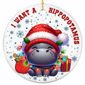 Chibi Baby Hippo in an Oversized Santa Hat Wound in Glowing Lights Beside a Gift Sack. Ceramic Keepsake.