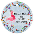 Pink Flamingo in Brown Antlers and a Scarf Standing on One Leg Inside a Light Wreath. Ceramic Keepsake.
