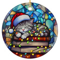 Gray Tabby in a Santa Hat Asleep on a Stack of Books, Tangled in Lights. Ceramic Keepsake for Cat Readers.