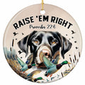 Black Lab Facing Forward With Mallards Flying Past Golden Cattails. Ceramic Keepsake for Waterfowl Hunters.