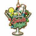 Shows a Martini Glass and Cocktail Shaker Wrapped in String Lights and Holly. Gift for Bartenders and Mixologists.