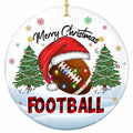 A Brown Football in an Oversized Santa Hat Draped in Bulbs Between Two Lit Pines. Ceramic Keepsake.